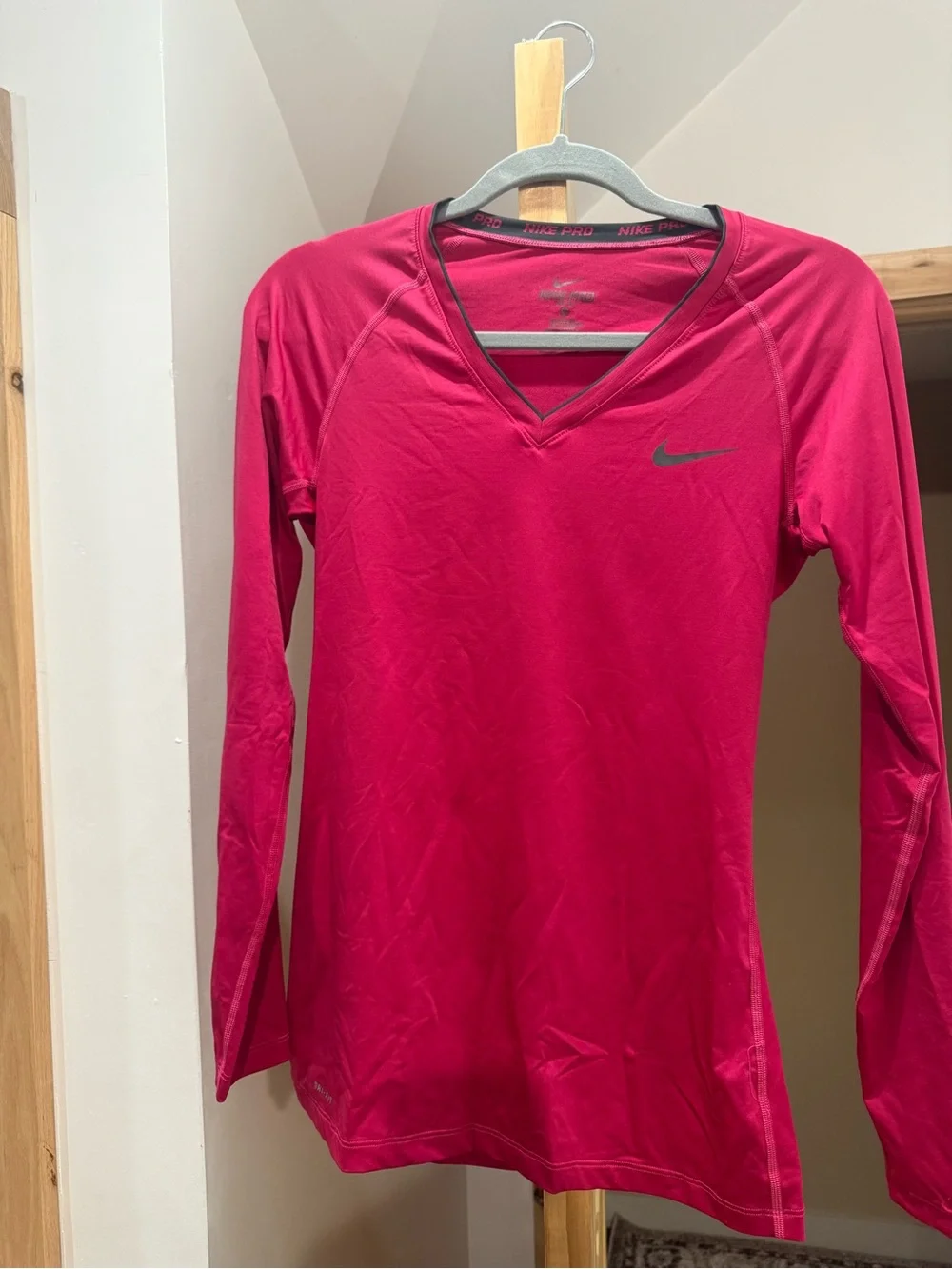 Nike Women’s Long-Sleeve V-Neck Performance Tee - Fuchsia